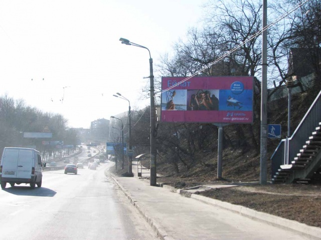 Щит 6x3,  ул. Телиги, 57 / напр. от ул. Фрунзе (1,2 км) в сторону м.Дорогожичи; подъем, на остановке, за пешеходным мостом, отличный обзор