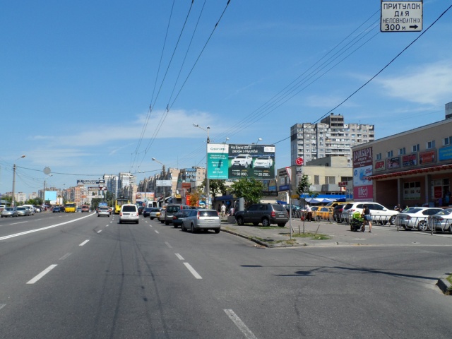 Щит 6x3, просп. Маяковского, 22; деловой центр Троещины: Фестивальный, рынок, Калинка-Малинка, ТЦ Маяк, Дарина, Буми и др.; остан. общ. транспорта Щит 6x3, просп. Маяковского, 22; деловой центр Троещины: Фестивальный, рынок, Калинка-Малинка, ТЦ Маяк, Дарина, Буми и др.; остан. общ. транспорта